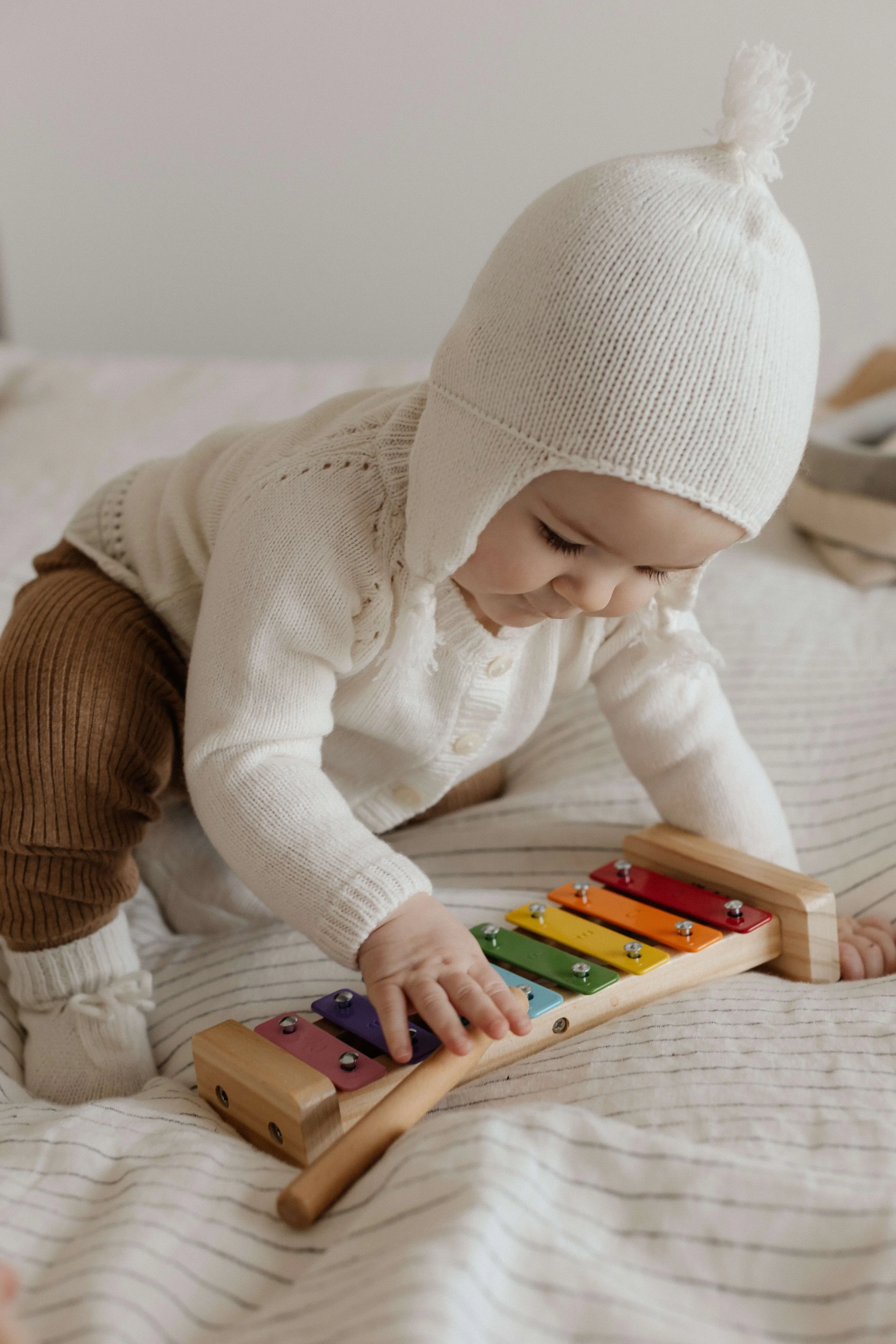White Cashmere Baby Hat with Tassel - Image 2